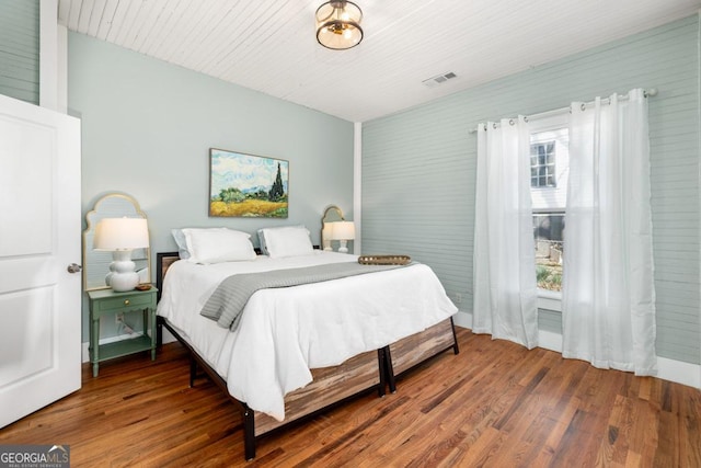 11 Pine St, Covington, GA 30014 - bedroom featuring wood finished floors