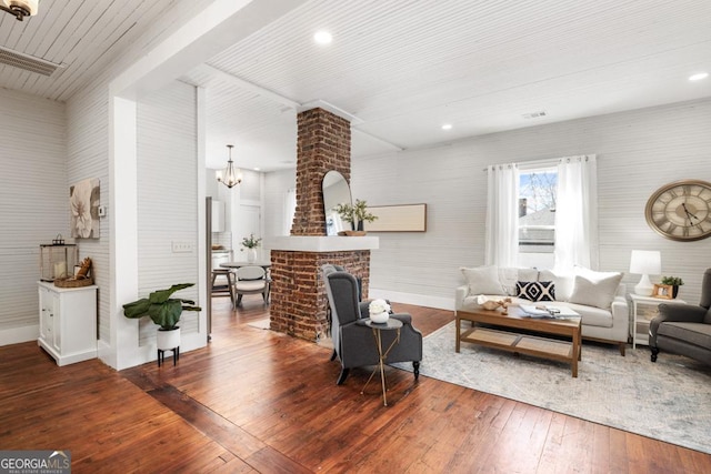 11 Pine St, Covington, GA 30014 - living area featuring a chandelier, hardwood / wood-style flooring, recessed lighting, and baseboards