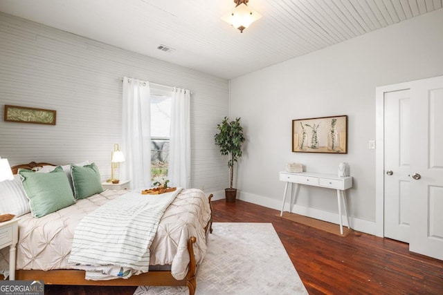 11 Pine St, Covington, GA 30014 - bedroom with wood finished floors and baseboards