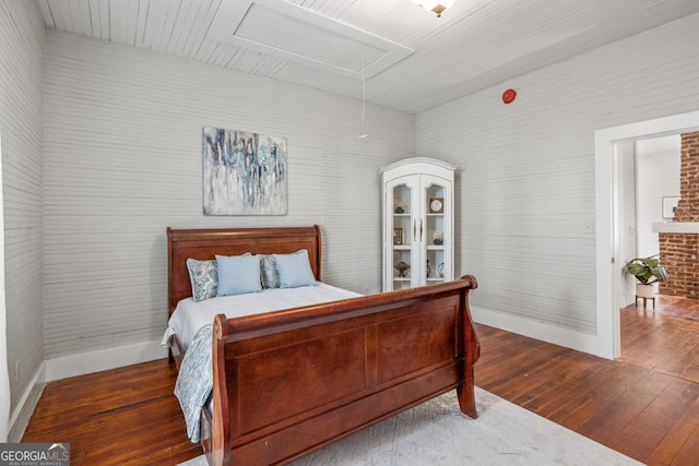 11 Pine St, Covington, GA 30014 - bedroom with hardwood / wood-style floors, attic access, and baseboards