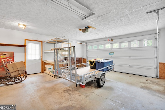 95 Stephens Dr, Covington, GA 30016 - garage featuring a garage door opener