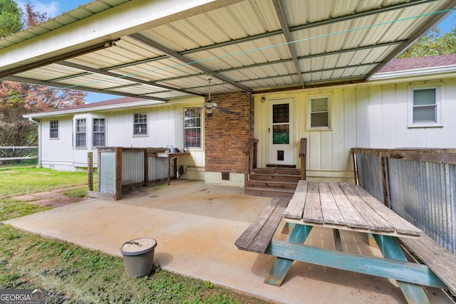 95 Stephens Dr, Covington, GA 30016 - back of property with entry steps, crawl space, and a patio area
