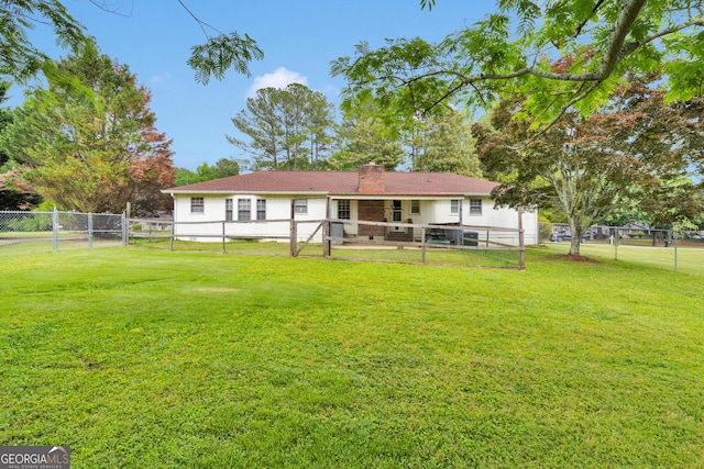95 Stephens Dr, Covington, GA 30016 - rear view of property featuring a gate and a chimney