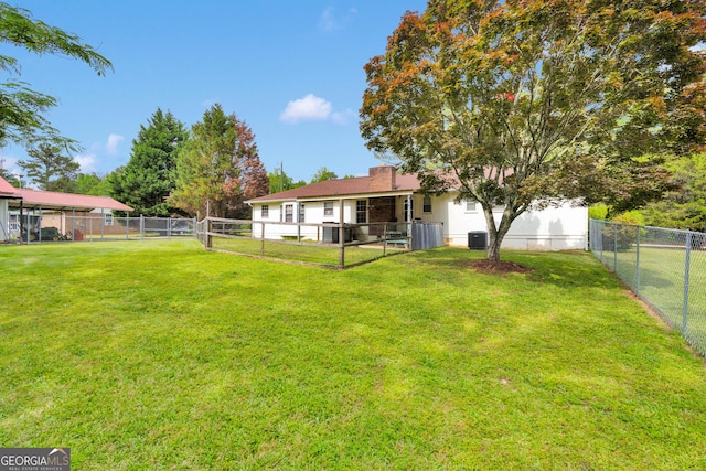 95 Stephens Dr, Covington, GA 30016 - view of yard featuring central AC