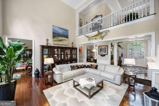 3182 Deepwater Dr, Gainesville, GA 30506 - living area with a high ceiling, ornamental molding, and wood finished floors