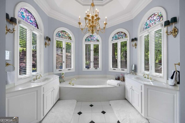 3182 Deepwater Dr, Gainesville, GA 30506 - full bath with two vanities, tile patterned floors, plenty of natural light, ornamental molding, and a garden tub