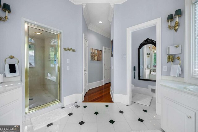 3182 Deepwater Dr, Gainesville, GA 30506 - full bath featuring tile patterned floors, ornamental molding, a stall shower, vanity, and toilet