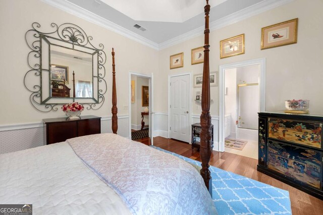 3182 Deepwater Dr, Gainesville, GA 30506 - bedroom with a wainscoted wall, wood finished floors, and ornamental molding