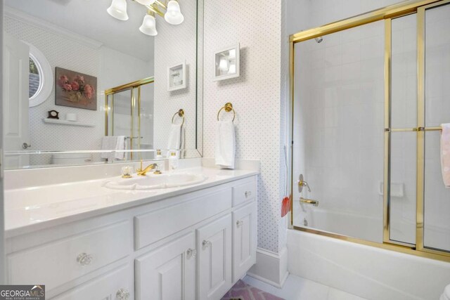 3182 Deepwater Dr, Gainesville, GA 30506 - full bath with wallpapered walls, vanity, shower / bath combination with glass door, and baseboards