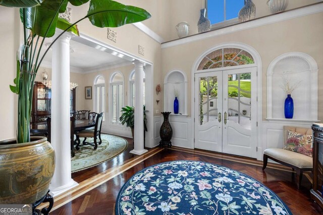 3182 Deepwater Dr, Gainesville, GA 30506 - foyer entrance featuring decorative columns, french doors, ornamental molding, and a towering ceiling