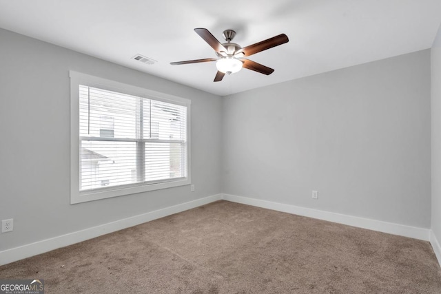 2342 Terrace View Cir SW, Atlanta, GA 30315 - spare room with carpet flooring, a ceiling fan, and baseboards