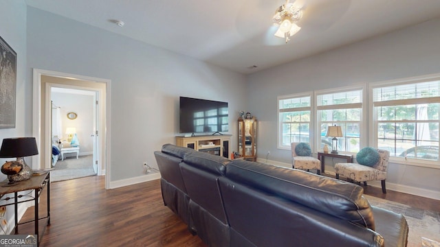 171 Stonebrook Way, Statesboro, GA 30458 - living area with dark wood-style floors, plenty of natural light, baseboards, and a ceiling fan