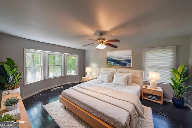 180 Old Airport Rd, Carrollton, GA 30116 - bedroom featuring baseboards, hardwood / wood-style floors, and ceiling fan