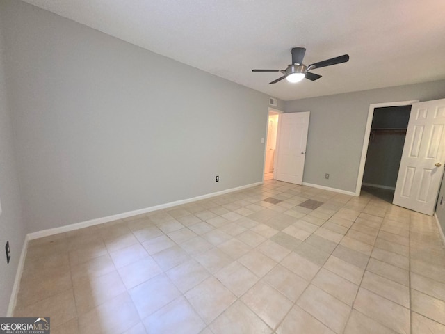 1212 Utoy Springs Rd Unit 46, Atlanta, GA 30331 - unfurnished bedroom featuring a ceiling fan and light tile patterned floors