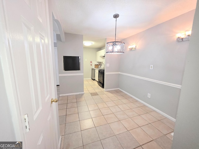 1212 Utoy Springs Rd Unit 46, Atlanta, GA 30331 - unfurnished room with light tile patterned floors and a chandelier