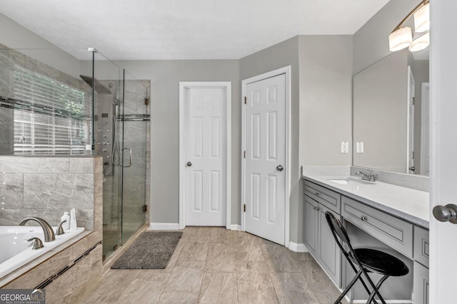 1500 Highland Farm Dr, Suwanee, GA 30024 - full bathroom with a stall shower, a garden tub, vanity, and baseboards