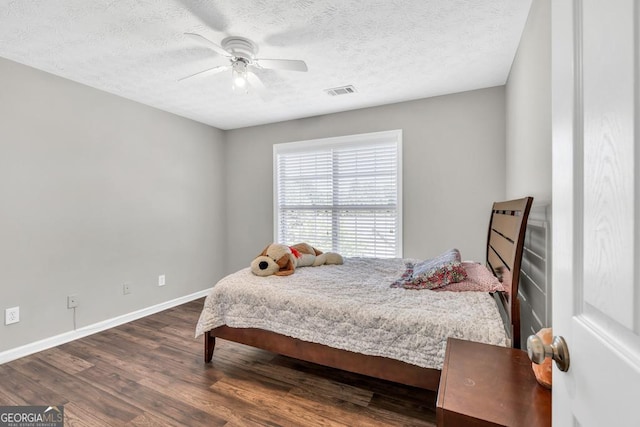 1500 Highland Farm Dr, Suwanee, GA 30024 - bedroom with dark wood-style flooring, baseboards, a textured ceiling, and ceiling fan