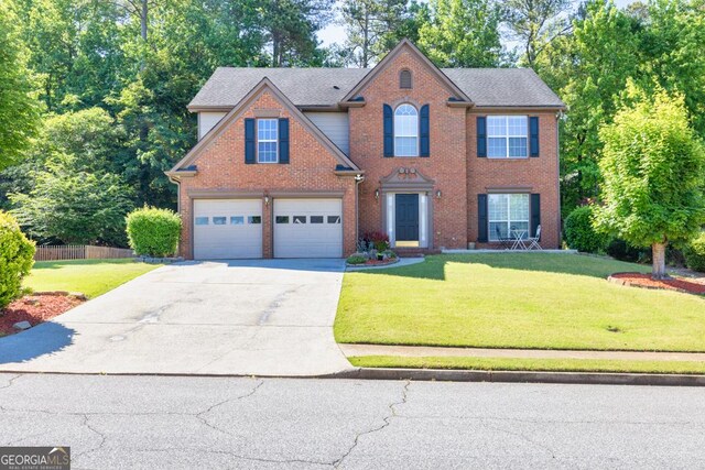 1500 Highland Farm Dr, Suwanee, GA 30024 - view of front of house with driveway, an attached garage, and brick siding