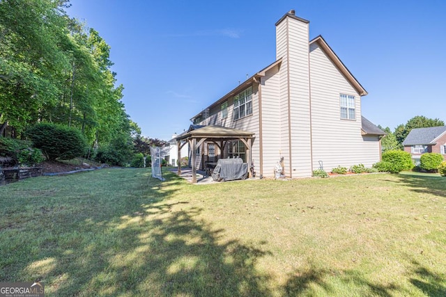 1500 Highland Farm Dr, Suwanee, GA 30024 - back of house with a gazebo, a chimney, and a yard