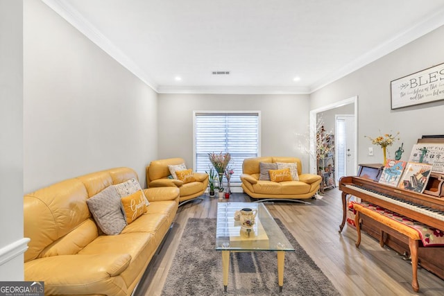 1500 Highland Farm Dr, Suwanee, GA 30024 - living room featuring crown molding, wood finished floors, and recessed lighting