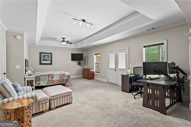 7493 Elderberry Dr, Douglasville, GA 30135 - living room with a tray ceiling, carpet floors, a ceiling fan, crown molding, and a desk