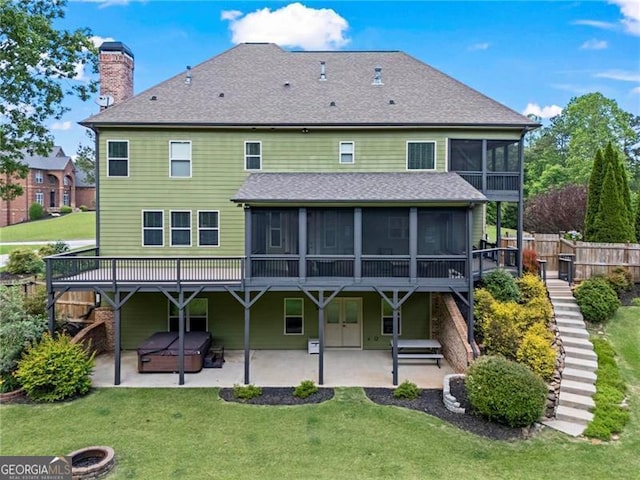 7493 Elderberry Dr, Douglasville, GA 30135 - back of house featuring a sunroom, stairway, a patio, and a chimney