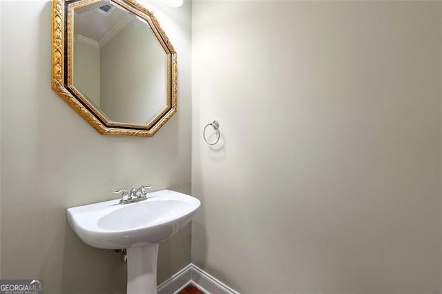 1399 Kilchis Falls Way, Braselton, GA 30517 - bathroom featuring crown molding