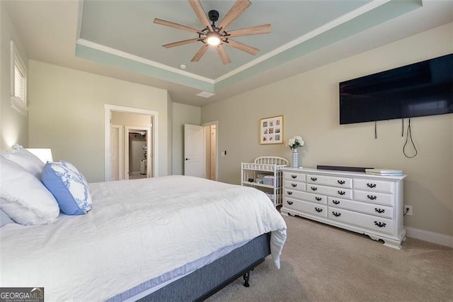 1399 Kilchis Falls Way, Braselton, GA 30517 - carpeted bedroom with a tray ceiling, crown molding, baseboards, and ceiling fan