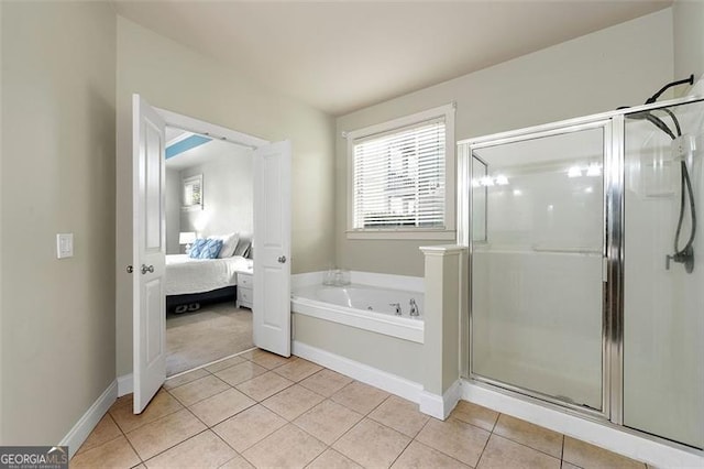 1399 Kilchis Falls Way, Braselton, GA 30517 - ensuite bathroom with tile patterned flooring, a tub with jets, a stall shower, and baseboards