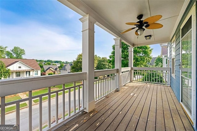 1399 Kilchis Falls Way, Braselton, GA 30517 - wooden deck with a ceiling fan and a residential view