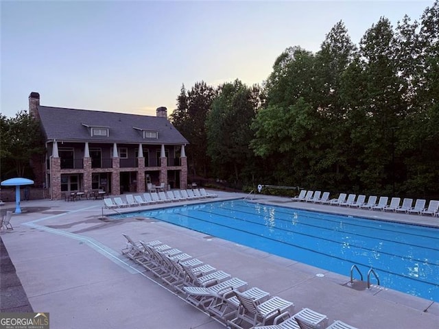 1399 Kilchis Falls Way, Braselton, GA 30517 - community pool with a patio