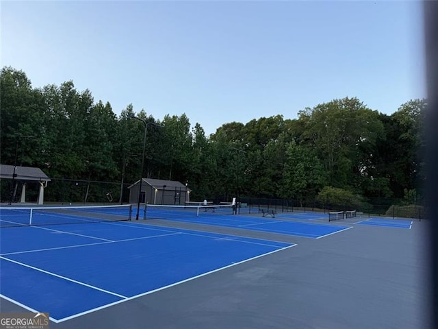 1399 Kilchis Falls Way, Braselton, GA 30517 - view of tennis court with a view of trees
