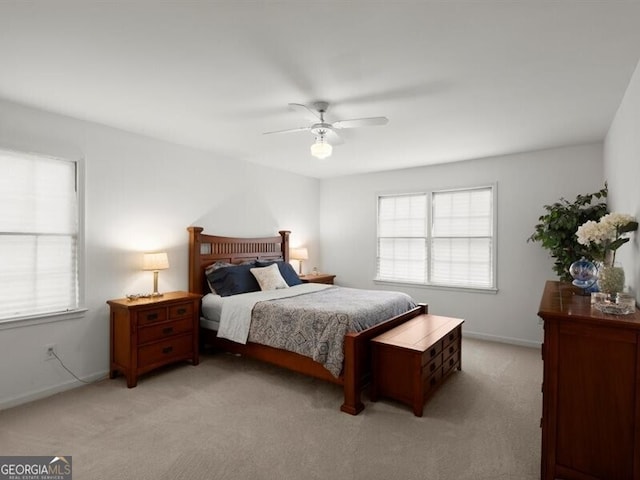 2458 Zachary Woods Dr, Marietta, GA 30064 - bedroom featuring light carpet, a ceiling fan, and baseboards
