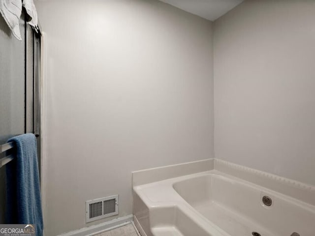 2458 Zachary Woods Dr, Marietta, GA 30064 - bathroom featuring a garden tub