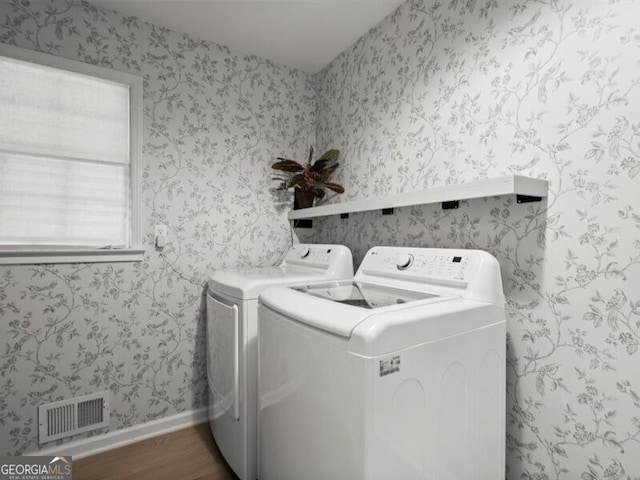 2458 Zachary Woods Dr, Marietta, GA 30064 - laundry room featuring separate washer and dryer, dark wood finished floors, baseboards, and wallpapered walls