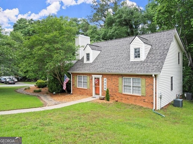 2458 Zachary Woods Dr, Marietta, GA 30064 - cape cod home featuring brick siding, a front yard, and roof with shingles