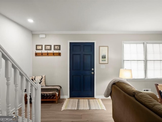 2458 Zachary Woods Dr, Marietta, GA 30064 - entrance foyer with wood finished floors, baseboards, crown molding, recessed lighting, and stairway