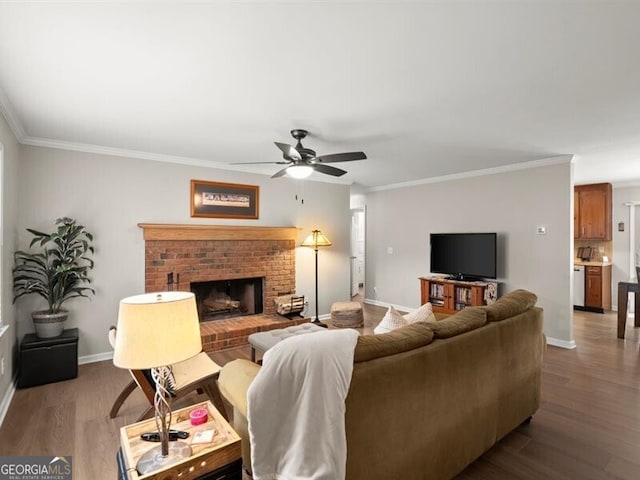 2458 Zachary Woods Dr, Marietta, GA 30064 - living room featuring crown molding, wood finished floors, baseboards, ceiling fan, and a fireplace