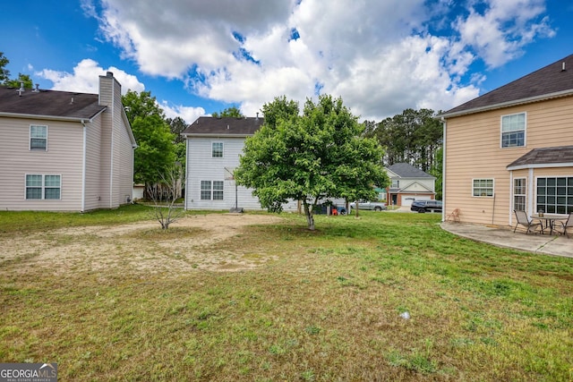 2000 Redwood Trce, Ellenwood, GA 30294 - view of green lawn featuring a patio