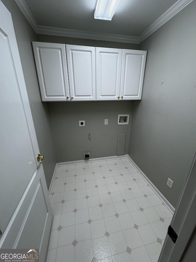 clothes washing area featuring hookup for an electric dryer, cabinet space, washer hookup, and ornamental molding