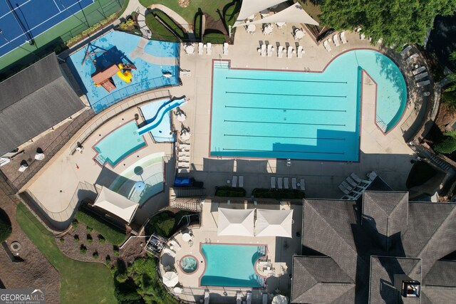 drone / aerial view of a pool