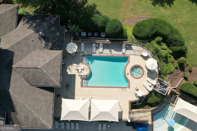 drone / aerial view of a pool