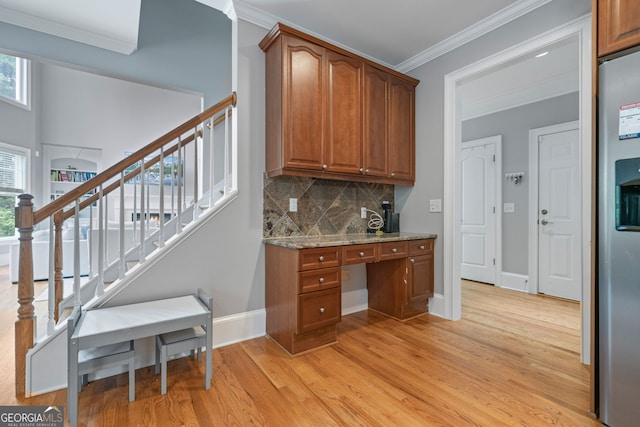 100 Braxton Way, Roswell, GA 30075 - bar area featuring light wood-style floors, stainless steel fridge, crown molding, decorative backsplash, and stairway