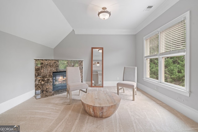 100 Braxton Way, Roswell, GA 30075 - sitting room featuring carpet floors, a high end fireplace, baseboards, crown molding, and vaulted ceiling