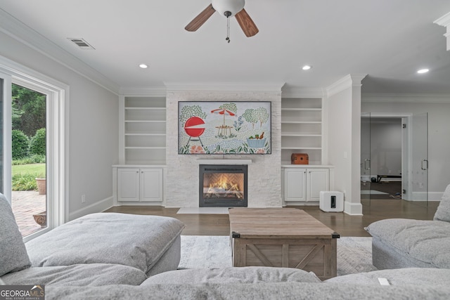 100 Braxton Way, Roswell, GA 30075 - living room with baseboards, ceiling fan, wood finished floors, a fireplace, and crown molding