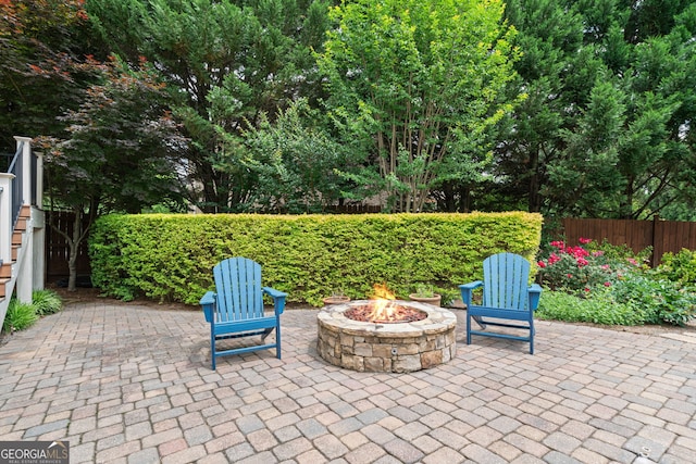 100 Braxton Way, Roswell, GA 30075 - view of patio / terrace featuring an outdoor fire pit
