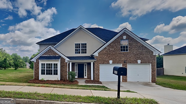 5052 Hickory Cir, Ellenwood, GA 30294 - view of front facade featuring concrete driveway, brick siding, a front yard, and an attached garage