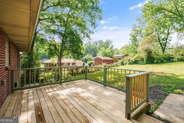 765 Shellnut Dr, Forest Park, GA 30297 - deck featuring a yard and an outbuilding
