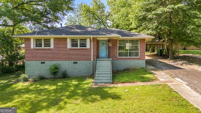 765 Shellnut Dr, Forest Park, GA 30297 - view of front facade with crawl space, brick siding, and concrete driveway