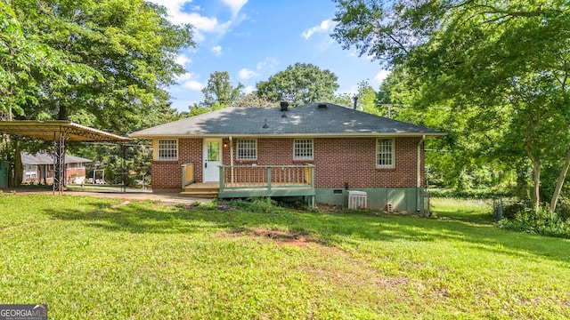 765 Shellnut Dr, Forest Park, GA 30297 - rear view of house featuring a lawn, a deck, brick siding, and a shingled roof